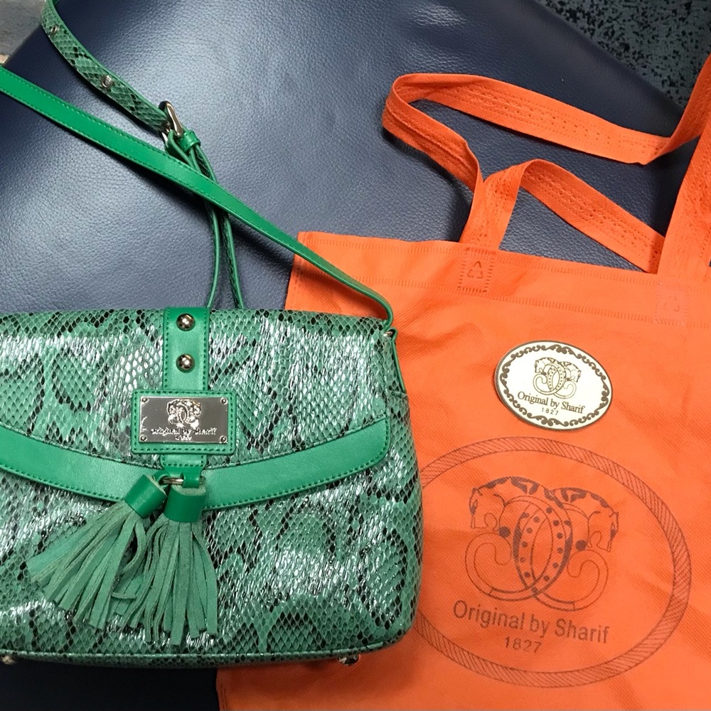 Original by SHARIF 1827 SHOULDER BAG. Multi colored print lined